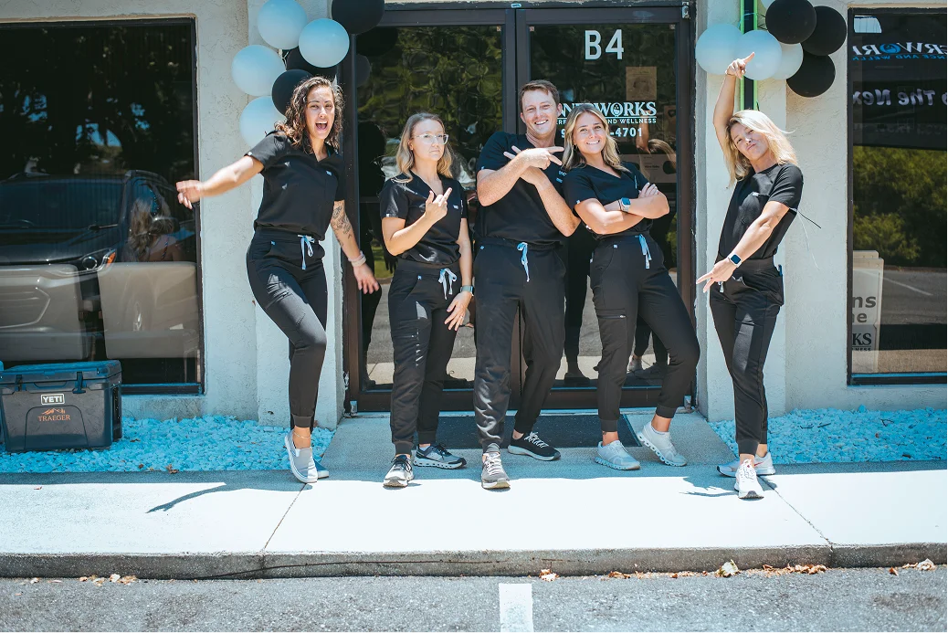 InnerWorks medical team in black scrubs outside B4 building